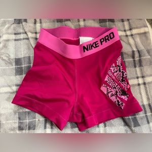 Womens Nike Pros. Pink dri-fit shorts size xs
